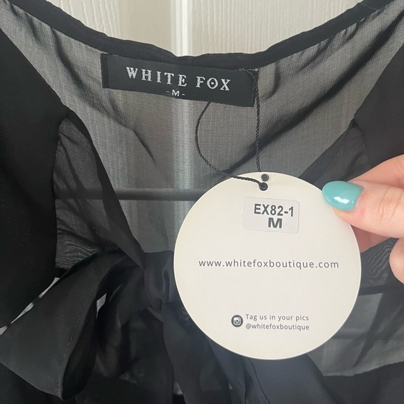 White Fox black one piece with tie at the front and built in shorts - Picture 3 of 3